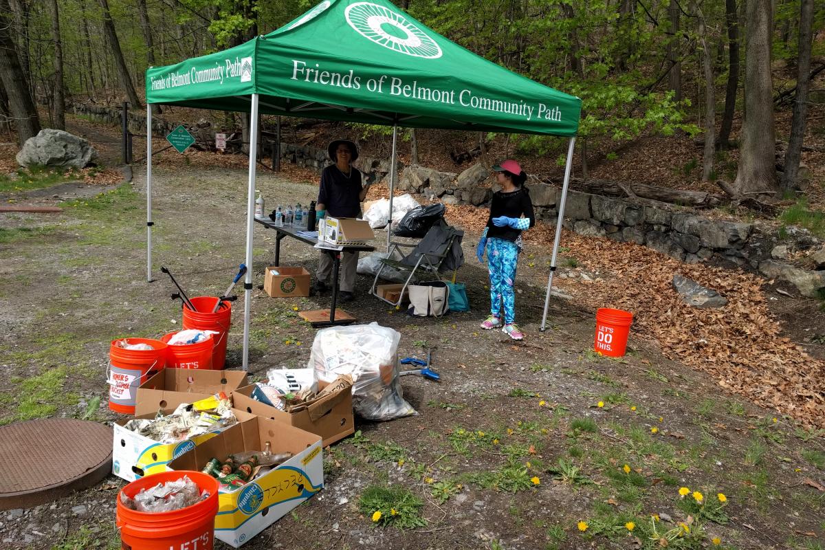 A green sign-up tent, 
