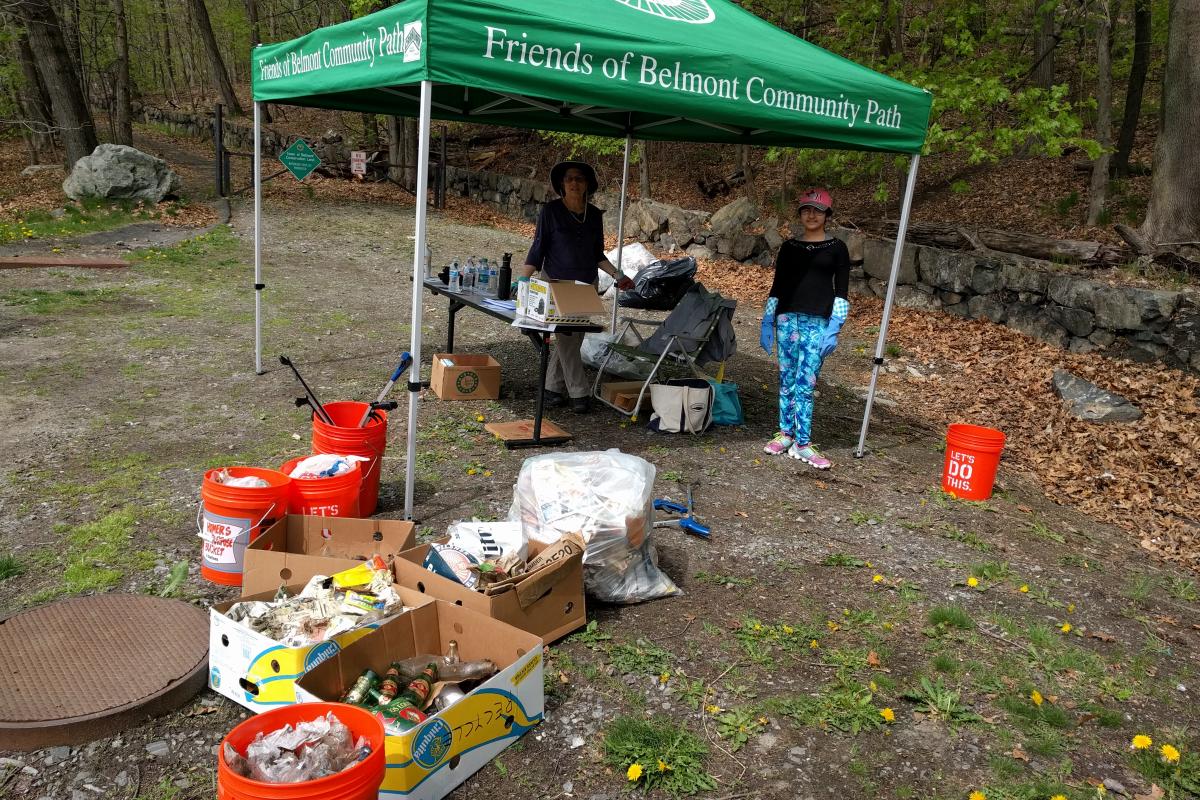 A green sign-up tent, 